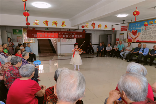淄川经济开发区中心小学:开展我们的节日·端午节献爱心敬老活动